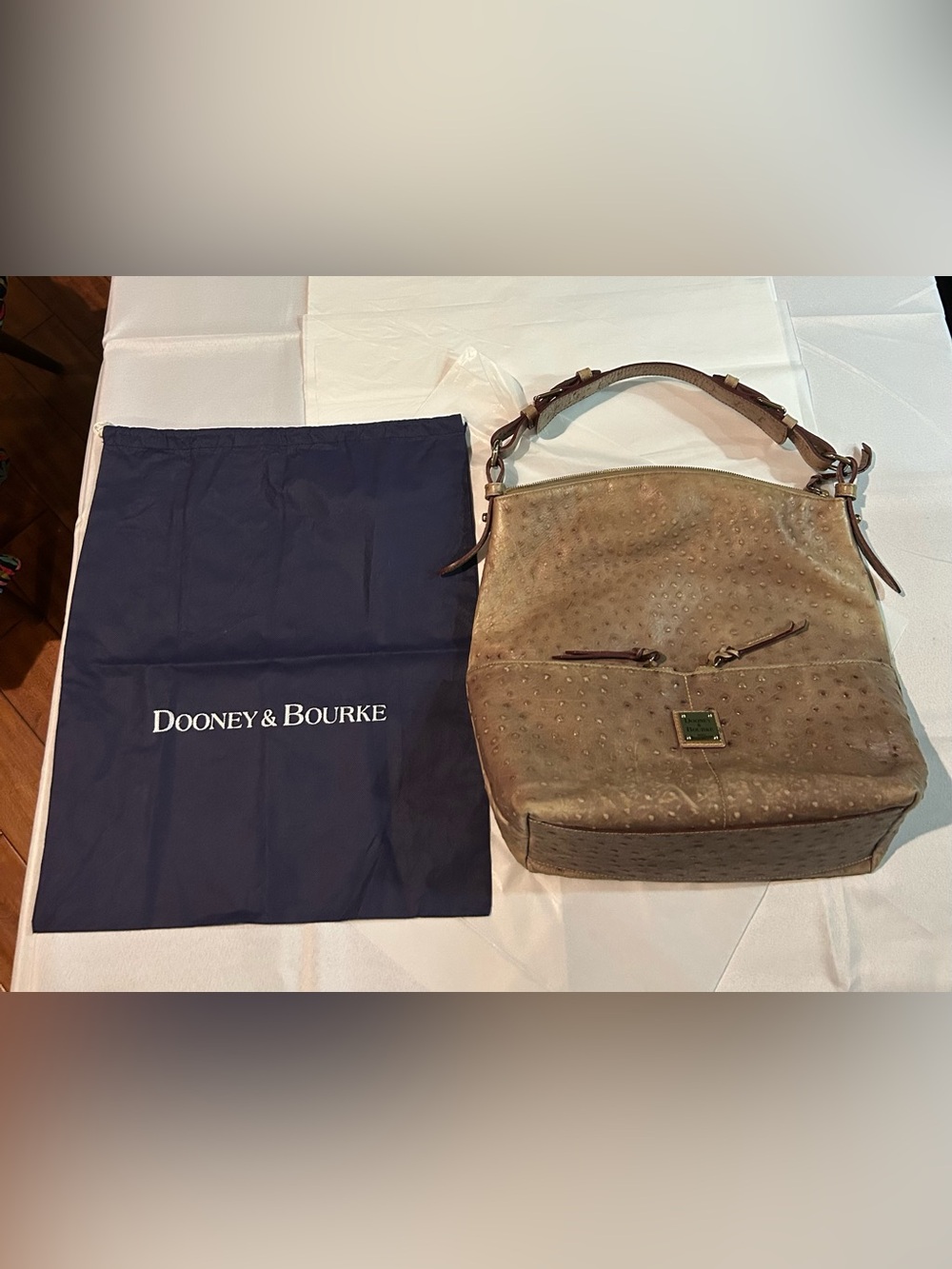 Dooney & Bourke Ostrich-Embossed Hobo shoulder bag in a light tan or taupe shade